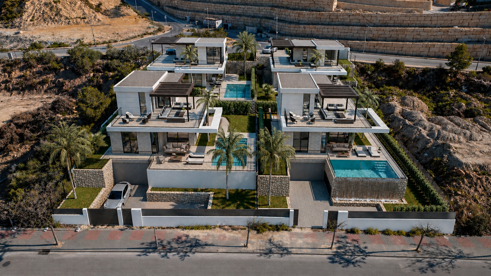 Aerial view of two modern Montiboli Sky villas with pools and terraces